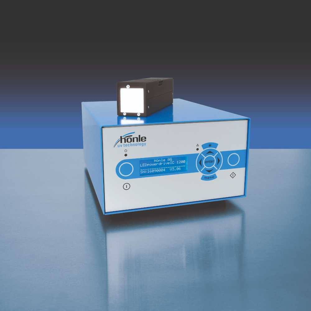LED power drive unit by Honle UV Technology, featuring a control panel and attached light source. Used for UV applications in various industries.