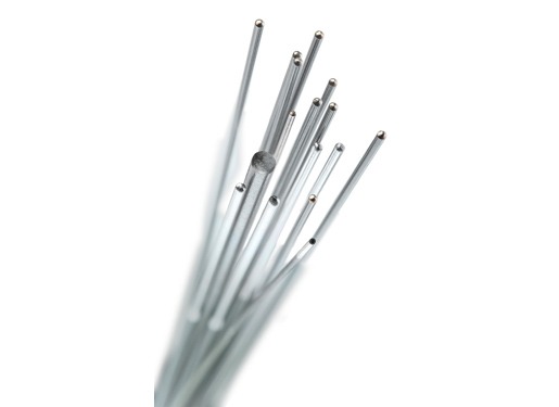 A collection of thin metal rods with pointed tips, arranged at varying angles, commonly used for precision work in welding or crafting.