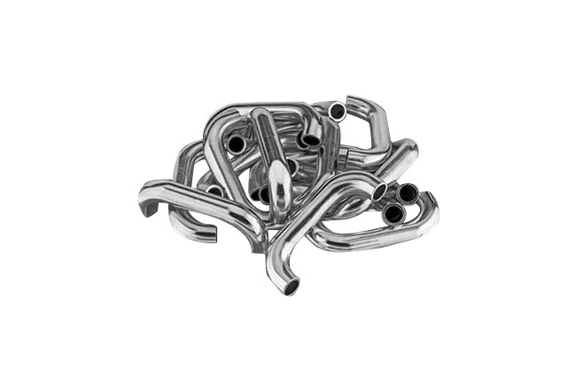 Metal exhaust tubes intertwined in a pile, showcasing their curved designs and shiny surfaces. Relevant for automotive parts discussions.